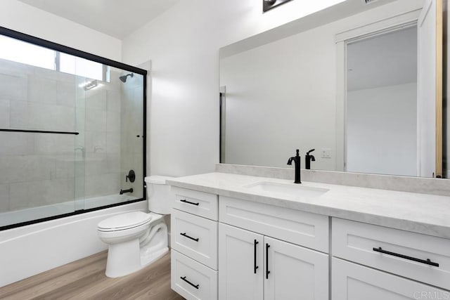 239 Futurity Ln, Fallbrook, CA 92028 - bathroom featuring vanity, enclosed tub / shower combo, and wood finished floors