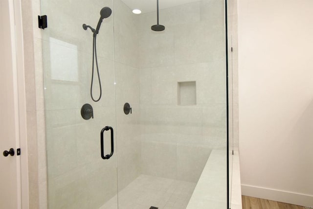 239 Futurity Ln, Fallbrook, CA 92028 - bathroom with a stall shower and wood finished floors