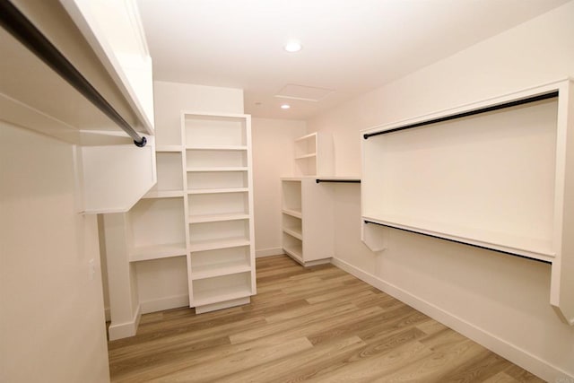 239 Futurity Ln, Fallbrook, CA 92028 - spacious closet featuring light wood-style floors and attic access