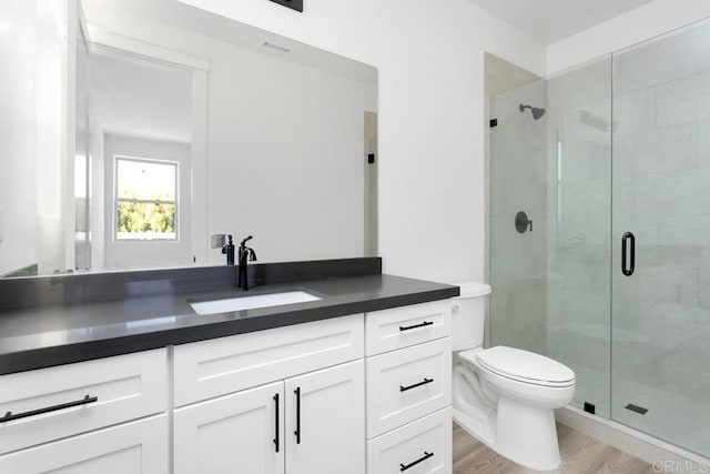 239 Futurity Ln, Fallbrook, CA 92028 - full bath with vanity, a shower stall, and wood finished floors