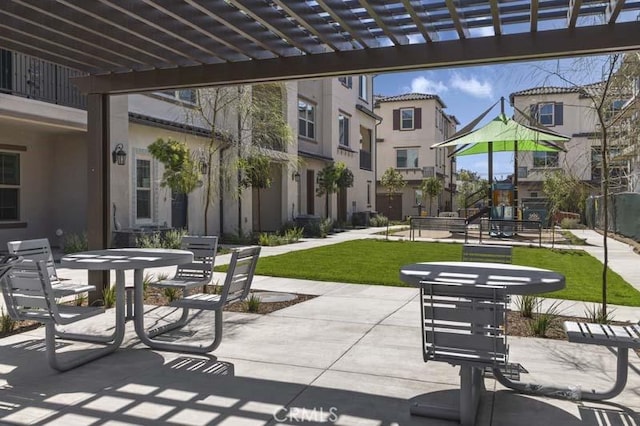 view of patio with a residential view and a pergola