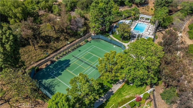 drone / aerial view of a pool area