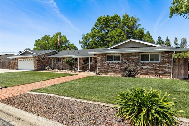 63 Our Way, Chico, CA 95973 - single story home with driveway, brick siding, a garage, and a chimney