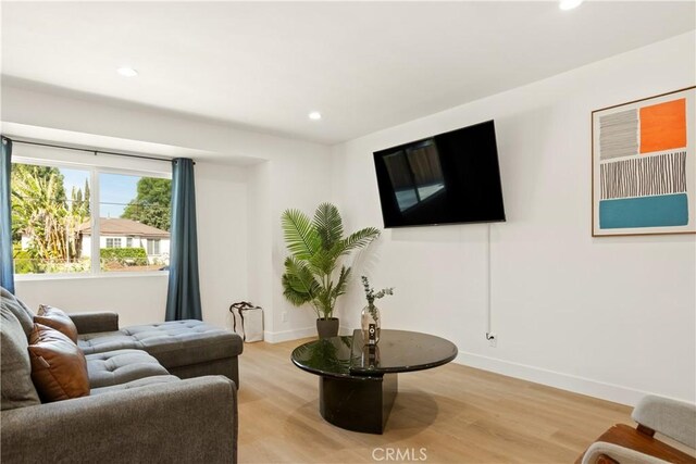6916 Etiwanda Ave, Reseda, CA 91335 - living room with recessed lighting, light wood finished floors, and baseboards