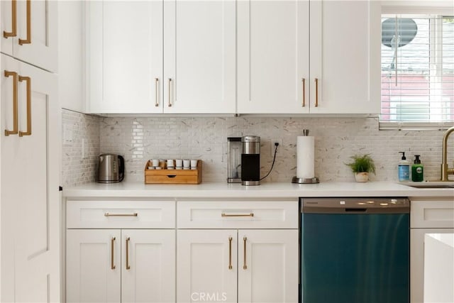 6916 Etiwanda Ave, Reseda, CA 91335 - kitchen featuring dishwashing machine, white cabinets, and a sink