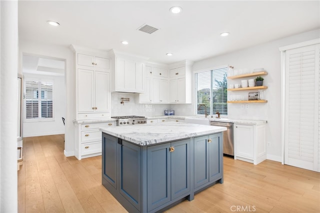 35987 Corte Renata, Murrieta, CA 92562 - kitchen with dishwasher, white cabinetry, a sink, light wood-style floors, and recessed lighting