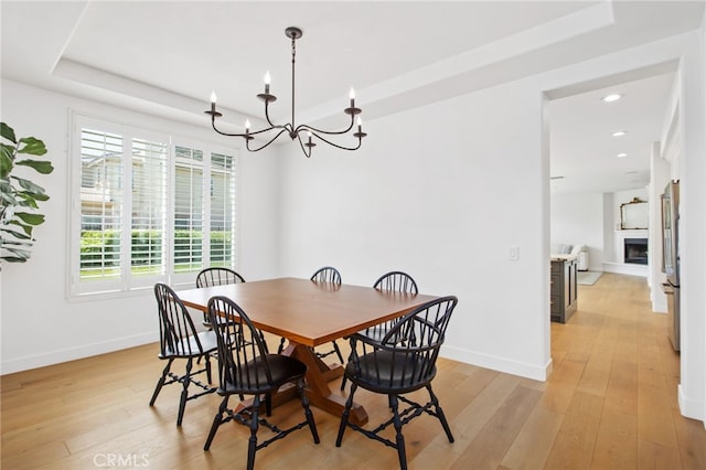 35987 Corte Renata, Murrieta, CA 92562 - dining space with a tray ceiling, a chandelier, light wood-type flooring, and recessed lighting