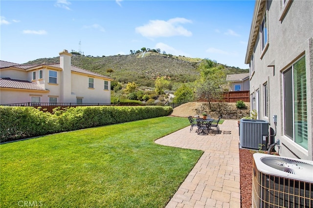 35987 Corte Renata, Murrieta, CA 92562 - view of yard featuring central AC unit, a patio area, and a mountain view