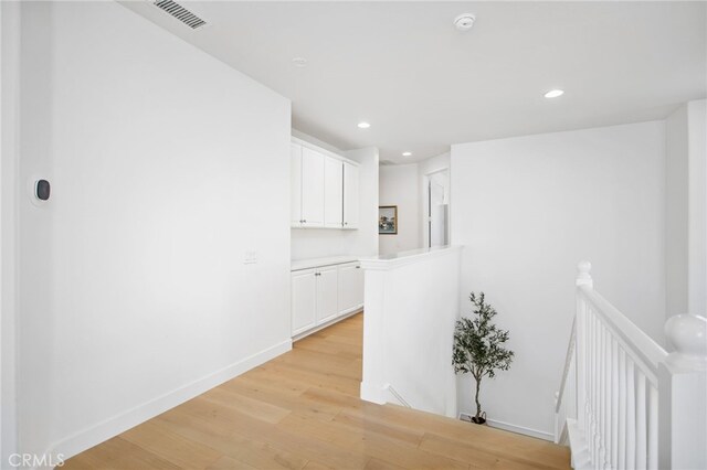 35987 Corte Renata, Murrieta, CA 92562 - hall with an upstairs landing, light wood-type flooring, recessed lighting, and baseboards