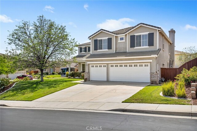 35987 Corte Renata, Murrieta, CA 92562 - view of front of property with brick siding, an attached garage, a chimney, and concrete driveway