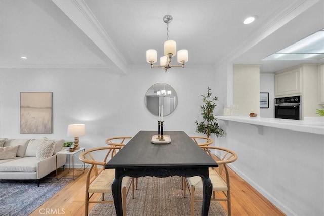 1006 Palm Ln, Redondo Beach, CA 90278 - dining room with a chandelier, light wood-type flooring, baseboards, recessed lighting, and crown molding