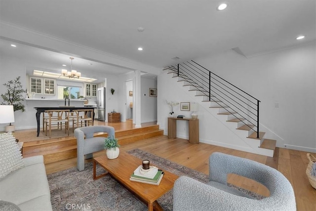 1006 Palm Ln, Redondo Beach, CA 90278 - living room featuring wood finished floors, stairway, a chandelier, recessed lighting, and ornamental molding