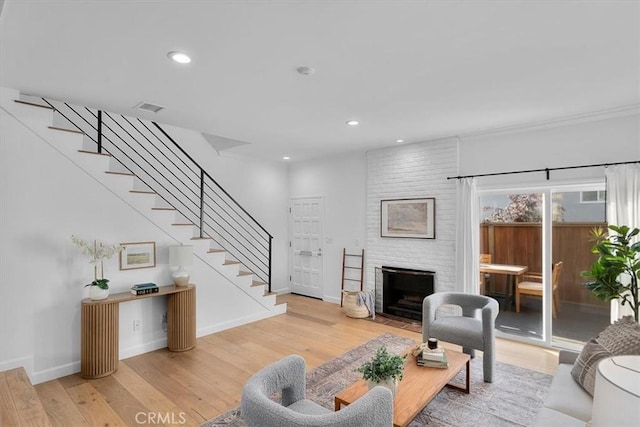 1006 Palm Ln, Redondo Beach, CA 90278 - living room featuring wood finished floors, stairs, recessed lighting, a fireplace, and baseboards