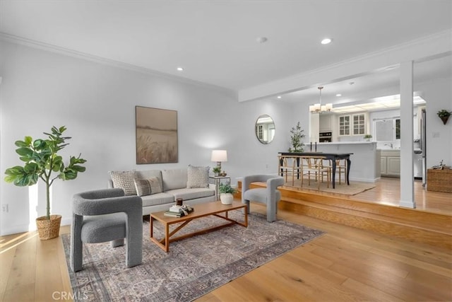 1006 Palm Ln, Redondo Beach, CA 90278 - living room with ornamental molding, light wood-style flooring, recessed lighting, and a chandelier