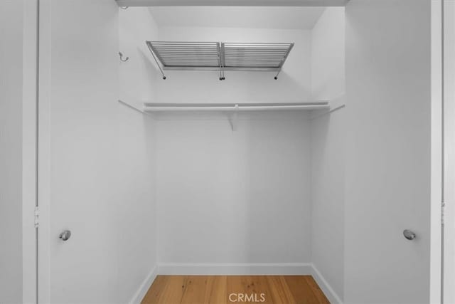 1006 Palm Ln, Redondo Beach, CA 90278 - spacious closet featuring wood finished floors