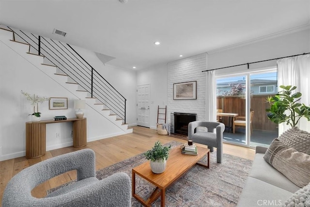 1006 Palm Ln, Redondo Beach, CA 90278 - living room featuring stairway, wood finished floors, recessed lighting, baseboards, and ornamental molding