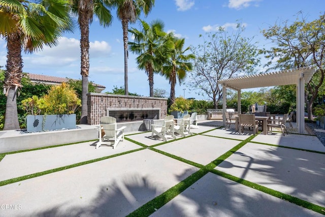 865 Orchid Way Unit A, Azusa, CA 91702 - view of patio with an outdoor brick fireplace, outdoor dining area, and a pergola