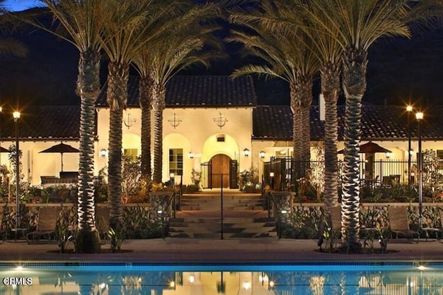 865 Orchid Way Unit A, Azusa, CA 91702 - pool at night featuring a community pool