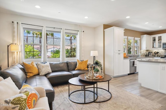 865 Orchid Way Unit A, Azusa, CA 91702 - living area with plenty of natural light, light wood finished floors, and recessed lighting