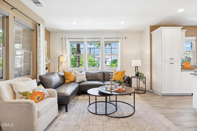 865 Orchid Way Unit A, Azusa, CA 91702 - living room with light wood finished floors, recessed lighting, and baseboards