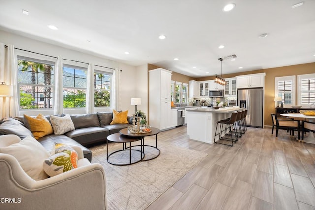 865 Orchid Way Unit A, Azusa, CA 91702 - living area with recessed lighting and light wood-type flooring