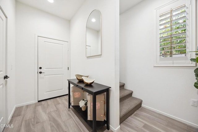 865 Orchid Way Unit A, Azusa, CA 91702 - hallway with light wood-type flooring, baseboards, recessed lighting, and stairway