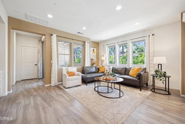 865 Orchid Way Unit A, Azusa, CA 91702 - living area featuring light wood finished floors, recessed lighting, and baseboards