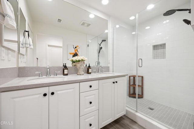 865 Orchid Way Unit A, Azusa, CA 91702 - full bath with a shower stall, double vanity, wood finished floors, and recessed lighting