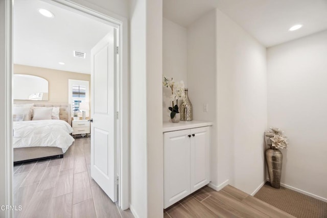 865 Orchid Way Unit A, Azusa, CA 91702 - hall with light wood finished floors, recessed lighting, and baseboards