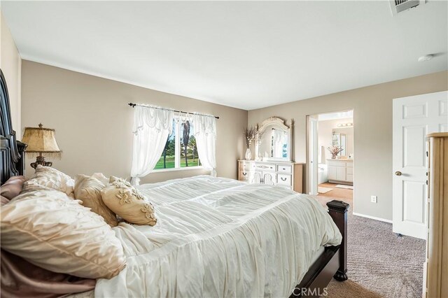 29288 Woodlea Ln, Menifee, CA 92584 - bedroom featuring carpet floors, baseboards, and connected bathroom