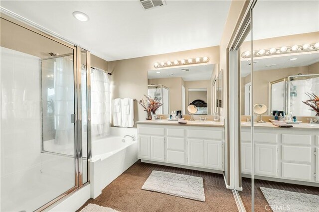 29288 Woodlea Ln, Menifee, CA 92584 - bathroom with a shower stall, a bath, and double vanity