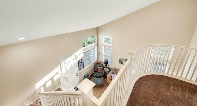 29288 Woodlea Ln, Menifee, CA 92584 - staircase featuring carpet floors, high vaulted ceiling, and french doors