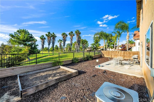 29288 Woodlea Ln, Menifee, CA 92584 - fenced backyard featuring a patio, central air condition unit, and a garden