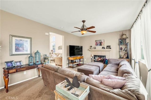 29288 Woodlea Ln, Menifee, CA 92584 - carpeted living area with baseboards, a fireplace, and ceiling fan