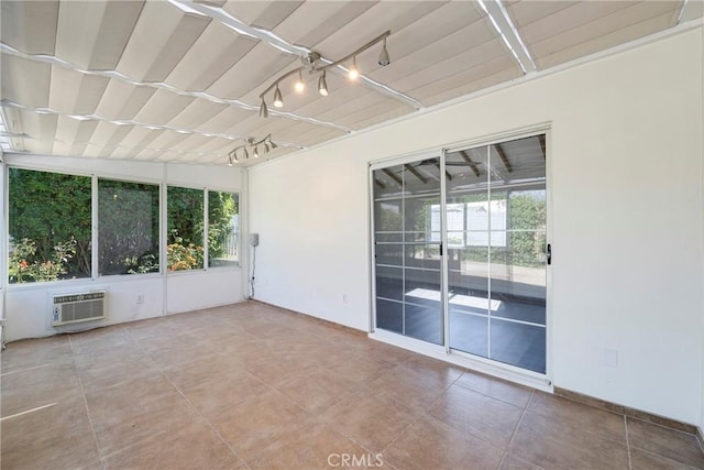 228 W Old Ml, Corona, CA 92882 - unfurnished sunroom featuring a wall mounted air conditioner and rail lighting