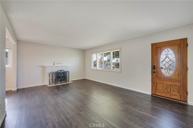 228 W Old Ml, Corona, CA 92882 - unfurnished living room featuring dark wood-type flooring and a fireplace