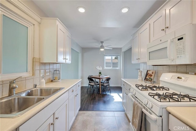 228 W Old Ml, Corona, CA 92882 - kitchen with white appliances, white cabinetry, light countertops, and recessed lighting