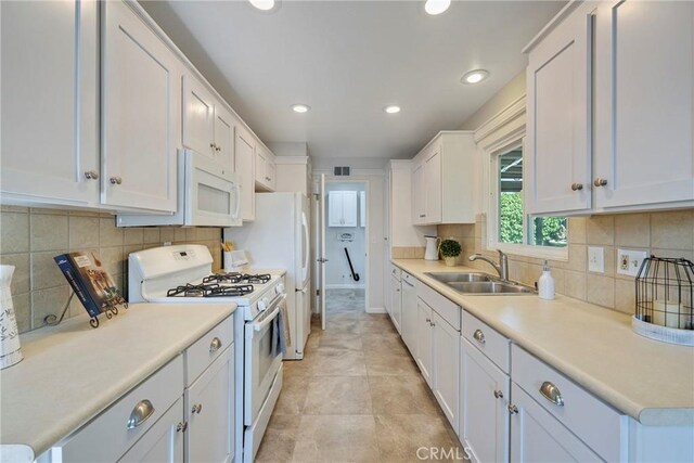 228 W Old Ml, Corona, CA 92882 - kitchen with white appliances, white cabinetry, light countertops, and recessed lighting