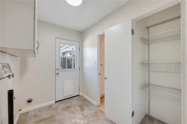 228 W Old Ml, Corona, CA 92882 - laundry room with baseboards