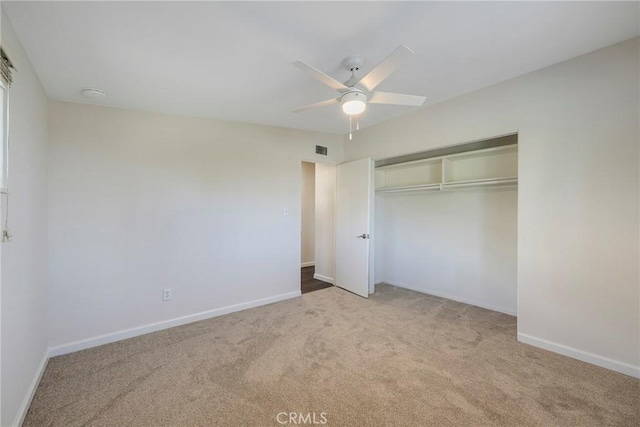 228 W Old Ml, Corona, CA 92882 - unfurnished bedroom featuring carpet flooring, a closet, and a ceiling fan
