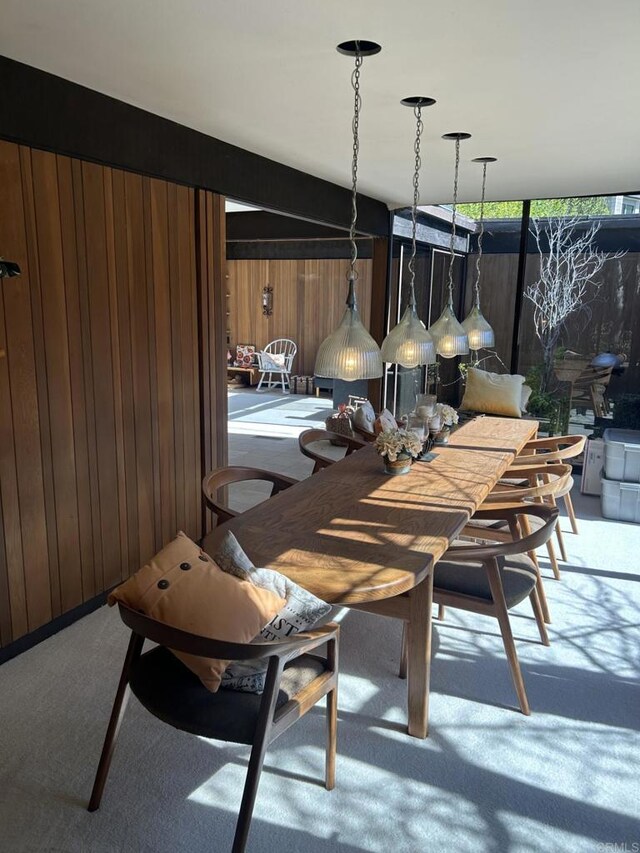 2029 Balboa Ave, Del Mar, CA 92014 - dining area with wood walls and carpet