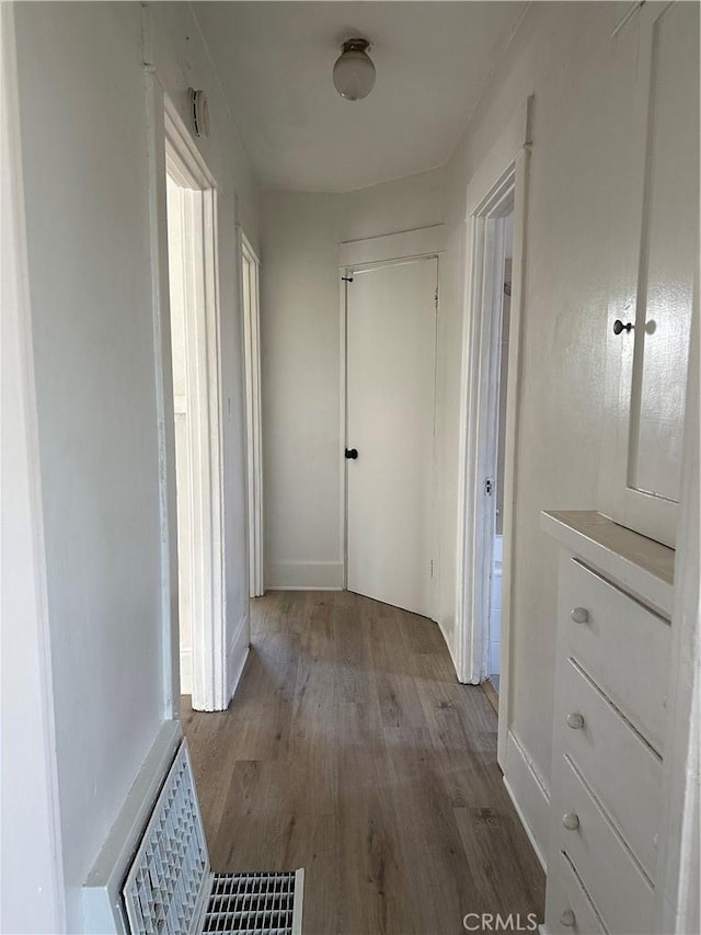 1073 Orizaba Ave, Long Beach, CA 90804 - hallway with wood finished floors and baseboards