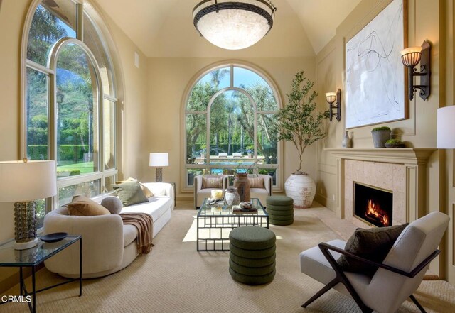 11113 Rocky High Rd, Santa Rosa, CA 93012 - living room with healthy amount of natural light, carpet flooring, vaulted ceiling, and a high end fireplace