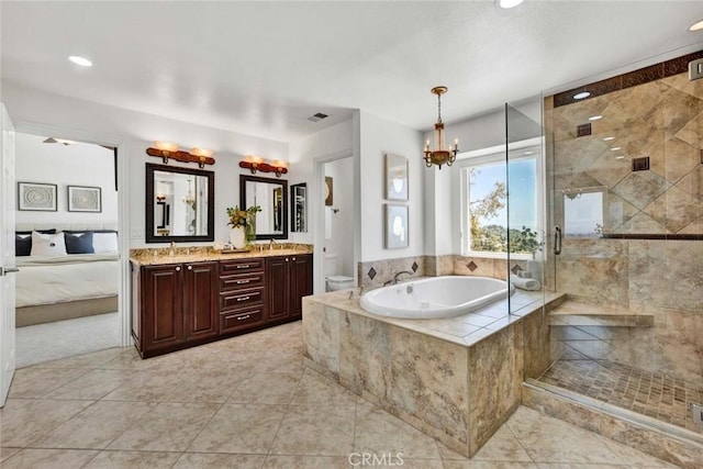 6142 E E W View Dr, Orange, CA 92869 - bathroom featuring a garden tub, a stall shower, double vanity, tile patterned flooring, and toilet