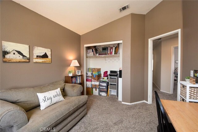 1065 Sycamore Ln, San Jacinto, CA 92582 - carpeted living room featuring lofted ceiling and baseboards