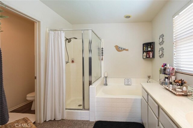 1065 Sycamore Ln, San Jacinto, CA 92582 - full bath with a stall shower, a bath, vanity, and toilet