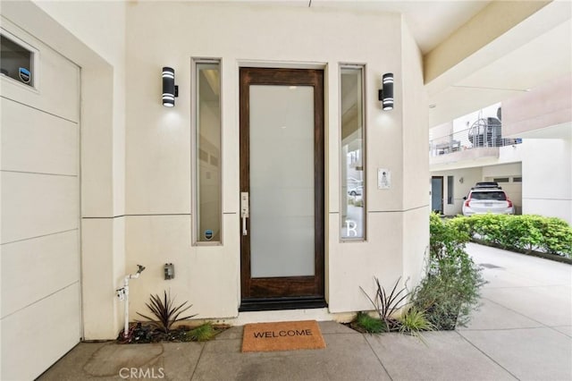 2205 Rockefeller Ln Unit B, Redondo Beach, CA 90278 - view of exterior entry featuring stucco siding