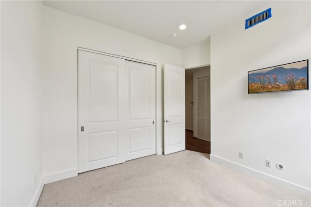 2205 Rockefeller Ln Unit B, Redondo Beach, CA 90278 - unfurnished bedroom with baseboards, light colored carpet, and a closet