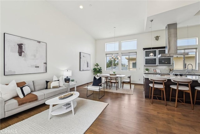 2205 Rockefeller Ln Unit B, Redondo Beach, CA 90278 - living area with high vaulted ceiling, dark wood-style floors, and recessed lighting