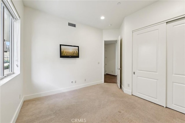 2205 Rockefeller Ln Unit B, Redondo Beach, CA 90278 - unfurnished bedroom with light carpet, multiple windows, a closet, and recessed lighting